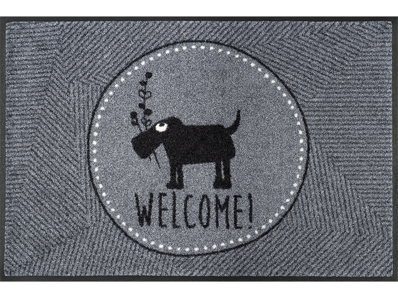 graue Fußmatte mit Schriftzug "WELCOME!" und Hundemotiv