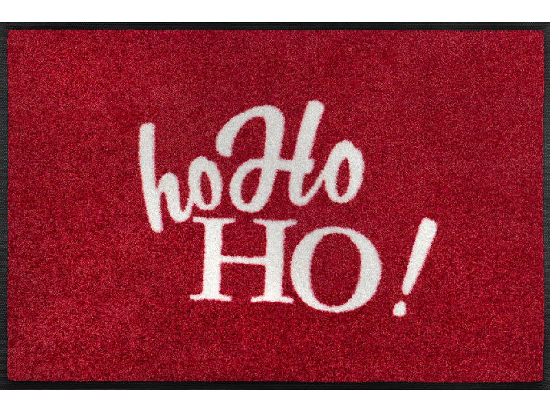 "ho Ho HO" Schriftzug auf roter Fußmatte